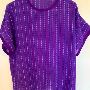 NWT Purple short sleeved blouse with various colors.